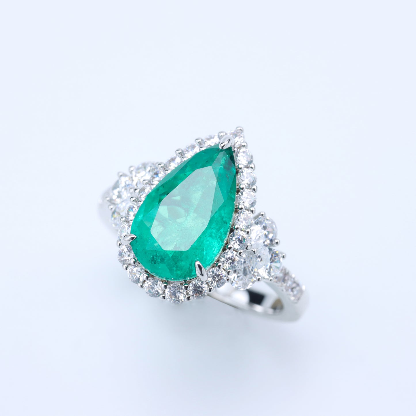 #JZ20048# Ring with Pear-Cut  Emerald and Zircon Accents