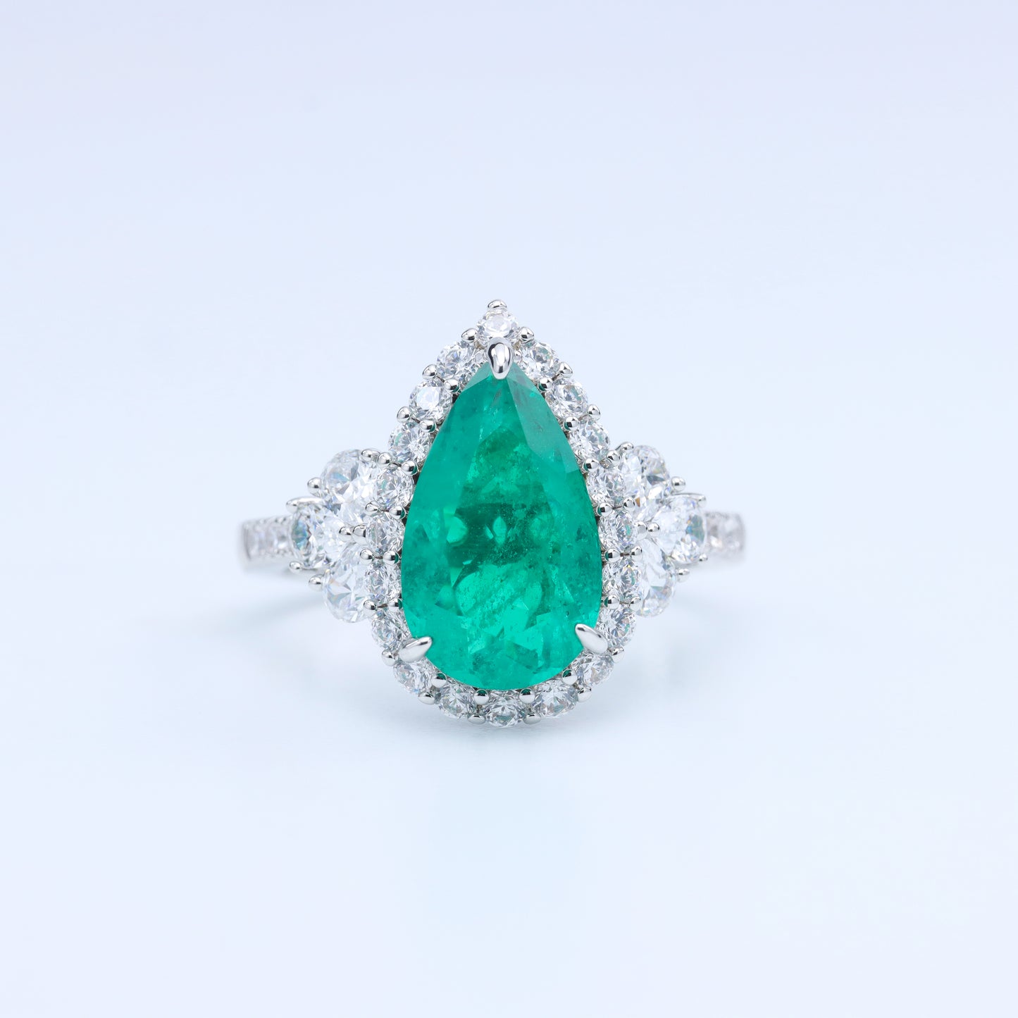 #JZ20048# Ring with Pear-Cut  Emerald and Zircon Accents